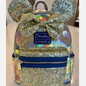 Disney Parks Loungefly backpack with Gold sequins sequence
